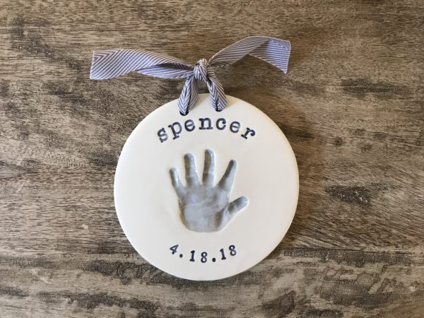 single handprint grey with blue text