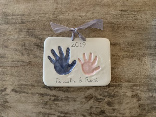 Brother and sister handprints